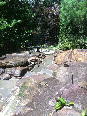 Lillac and Blue Green Flagstone Walkway with Rock Croppings